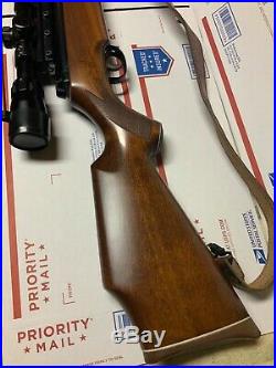 Vintage Beeman Kodiak air rifle. 25 cal withswift scope 6-18x50 and leather sling